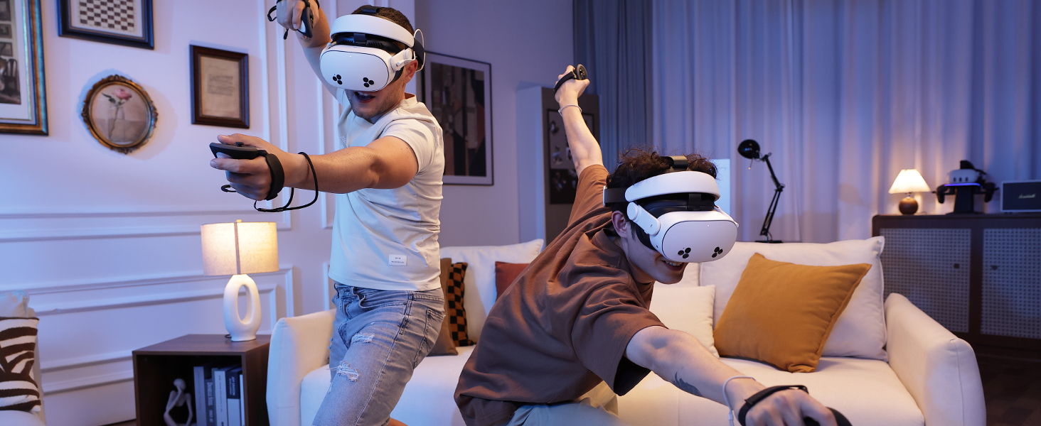 Two individuals playing VR games with H4 Boost Halo Battery Strap