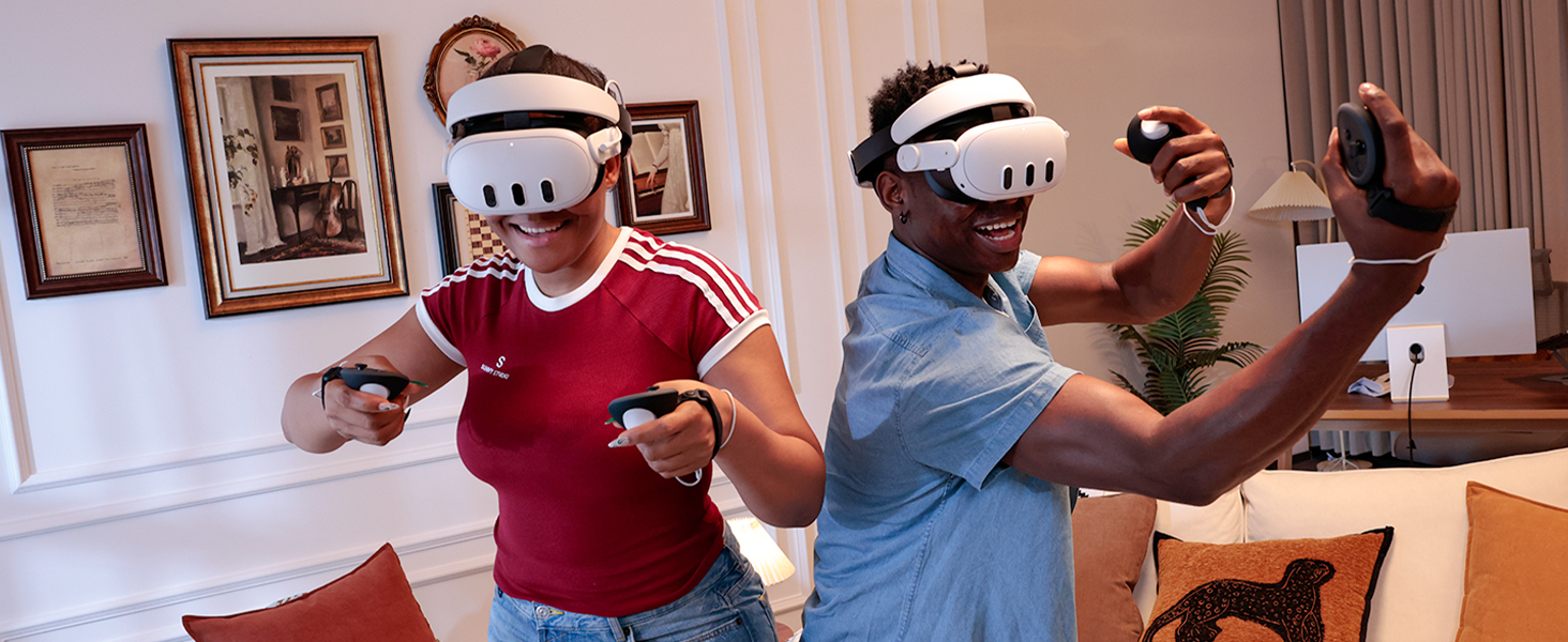 Two individuals playing VR games with H4 Boost Halo Battery Strap