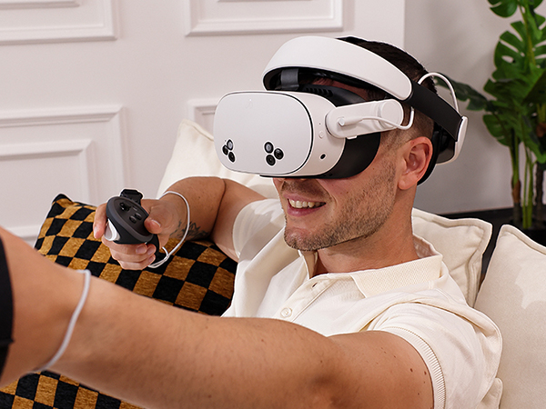 Person experiencing virtual reality technology at home.